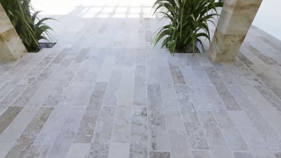 Carrelage en travertin effet parquet – nouveau modèle disponible chez EOS Carrelage à Martigues, Marseille, Fréjus et Cannes, idéal pour sols intérieurs et extérieurs au style naturel et élégant.